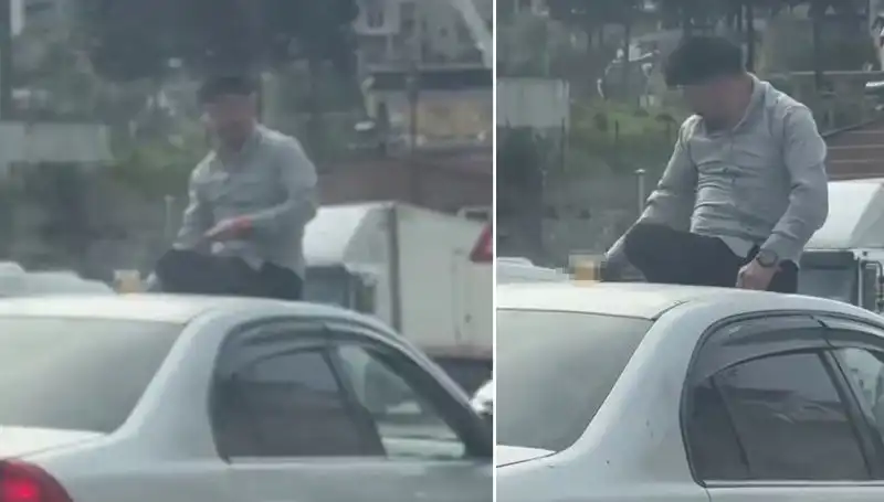 Trafikte Görenleri Şaşkına Çeviren Olay: Otomobil Üzerinde Alem Yapmak!